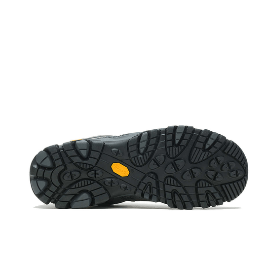 Black hiking boot sole with orange label on a white background