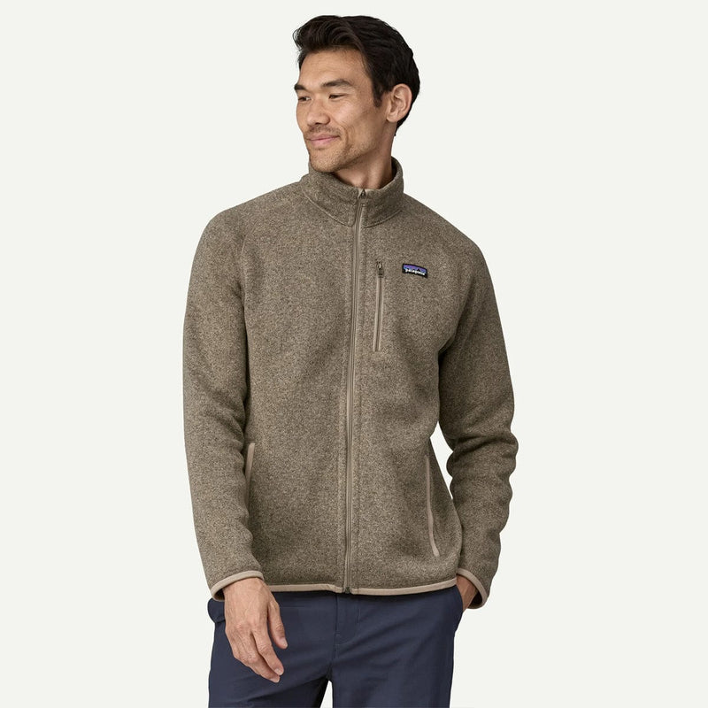 Load image into Gallery viewer, Man wearing a brown fleece jacket with a visible brand logo on a white background