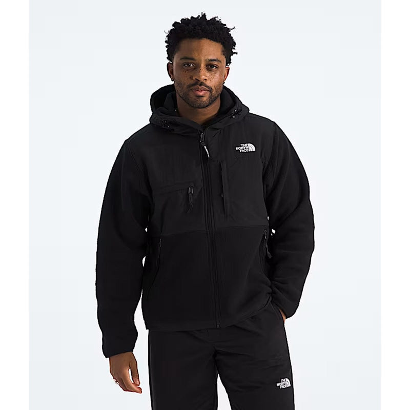Load image into Gallery viewer, Person wearing a black jacket with a brand logo on a white background
