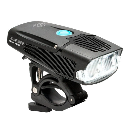 Black bicycle light with clip on a white background