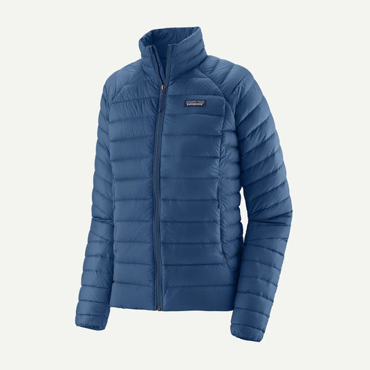 Blue puffer jacket with a brand logo on a light gray background