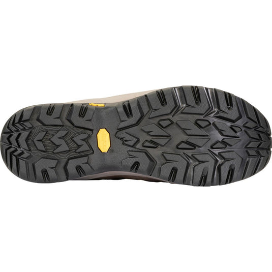 Close-up of a shoe sole with a textured pattern on a white background