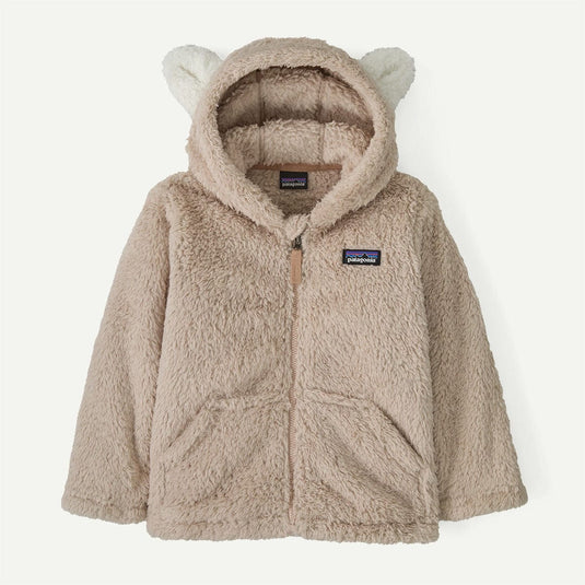 Children's beige fleece jacket with bear ears and Patagonia logo on a white background
