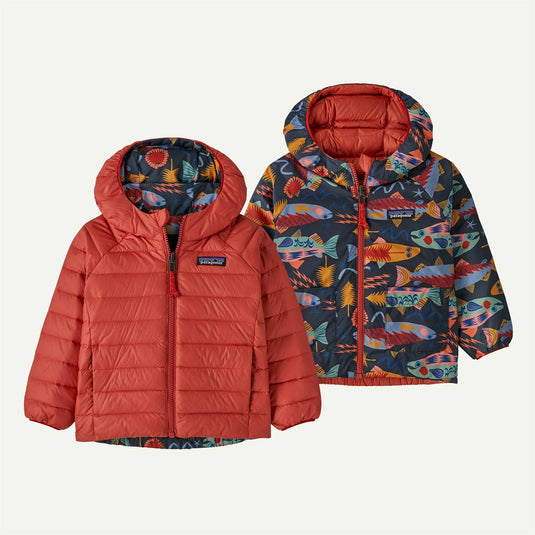 Two children's jackets, one red and one with a colorful pattern, on a light gray background.