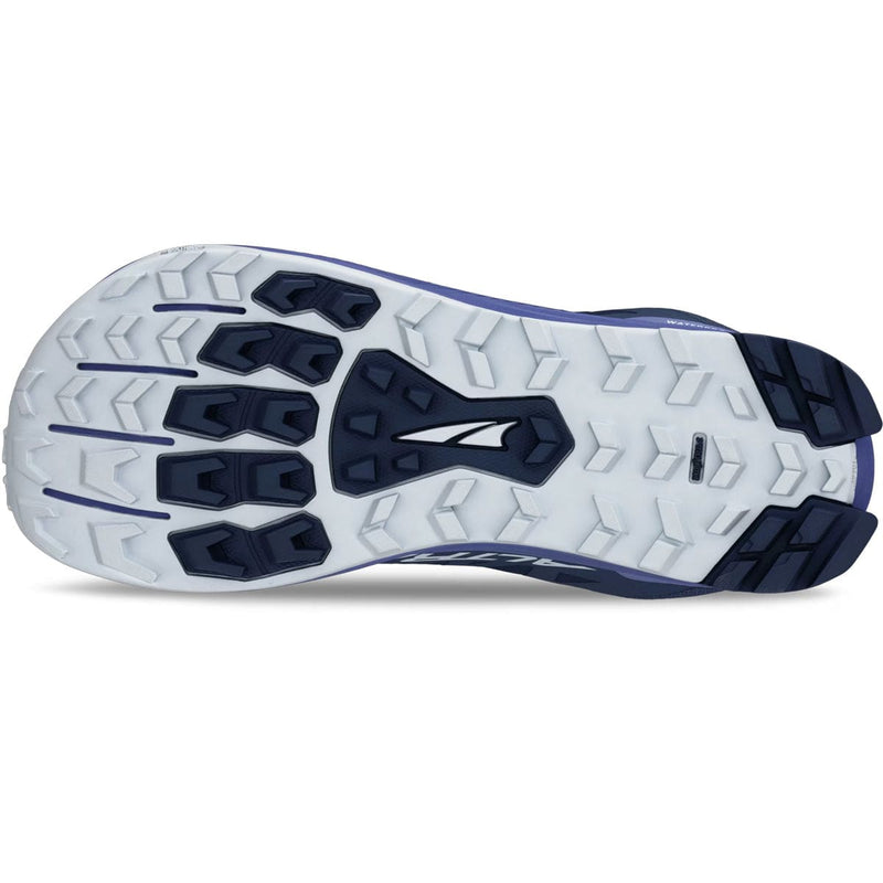 Load image into Gallery viewer, Close-up of a running shoe sole with tread pattern on a white background