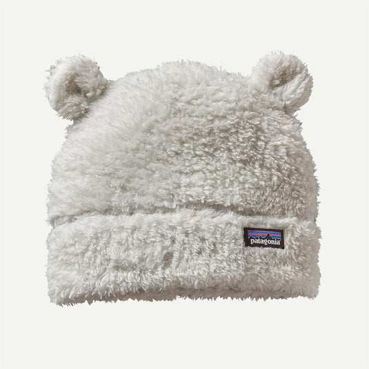 White fleece beanie with bear ears and Patagonia logo on a white background