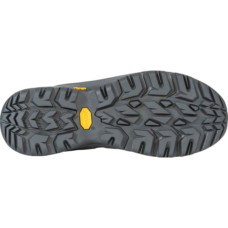 Load image into Gallery viewer, Close-up of a shoe sole with a textured pattern and a yellow label on a white background